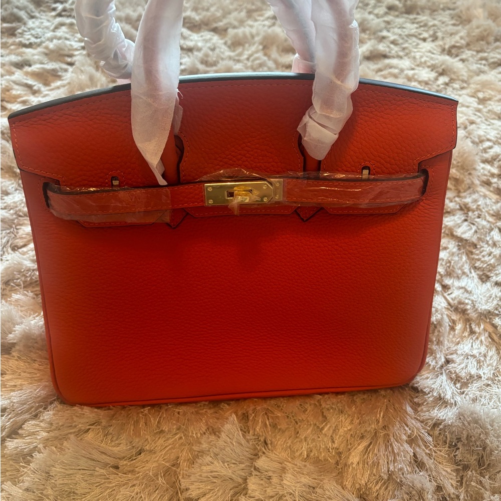 ****SOLD*****Elegant Orange Leather Handbag